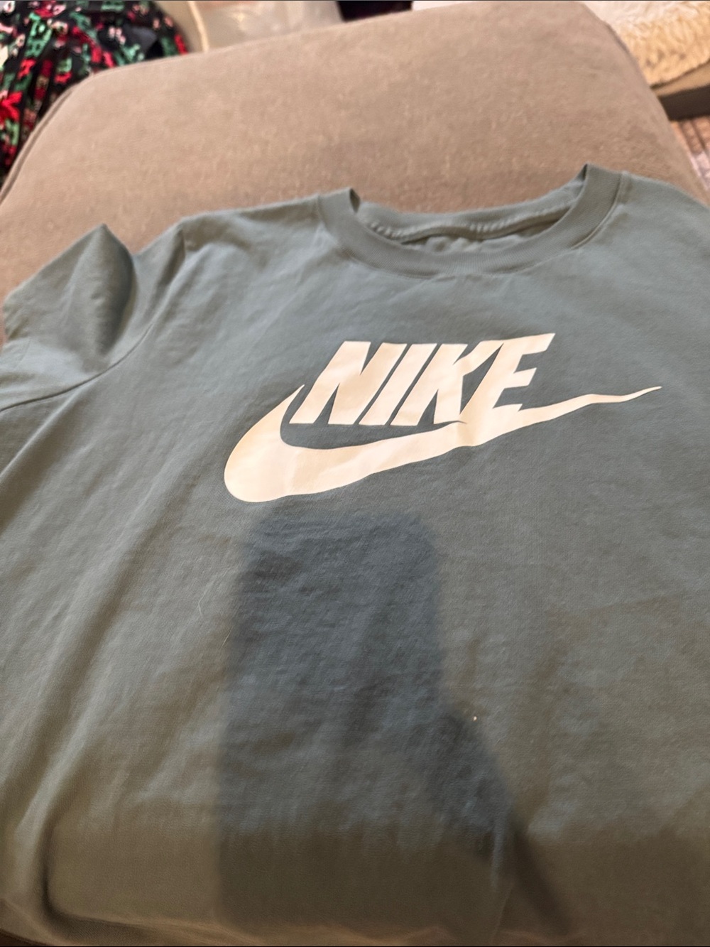 Blue green women’s Nike shirt